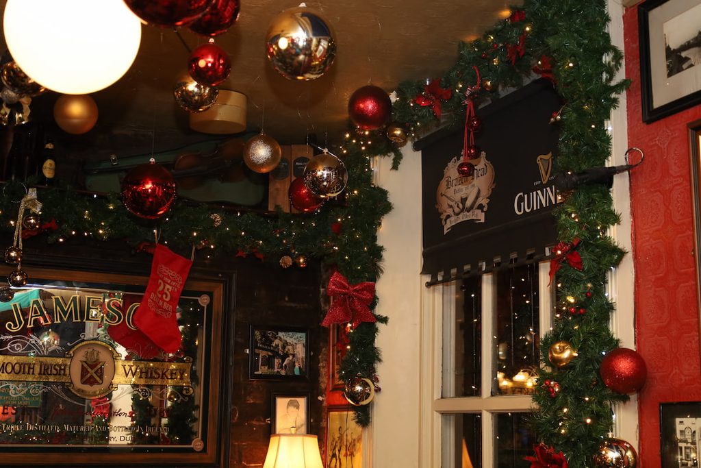 Festive Christmas decorations inside The Brazen Head, a historic Irish pub in Dublin city centre.