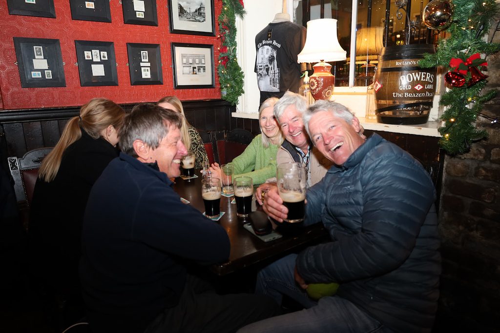 Cosy historic interior of The Brazen Head, an atmospheric venue for Christmas parties in Dublin.