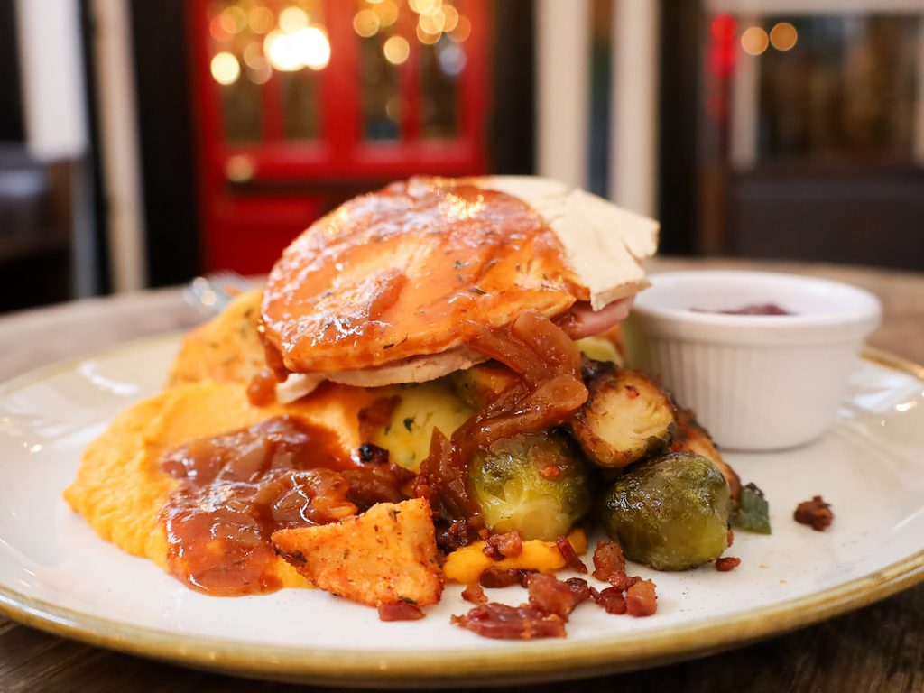 Traditional roast turkey and ham Christmas dinner served at The Brazen Head in Dublin.