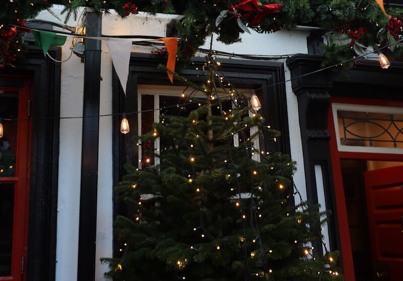 Festive Christmas decorations inside The Brazen Head, a historic Irish pub in Dublin city centre.